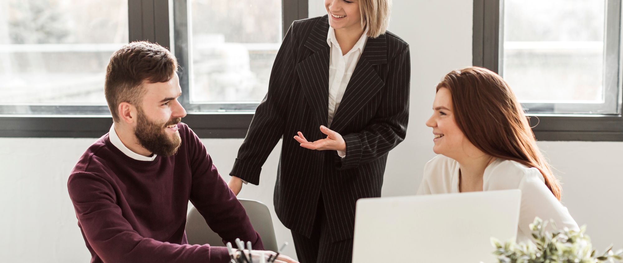 A team of project managers having an enjoyable discussion