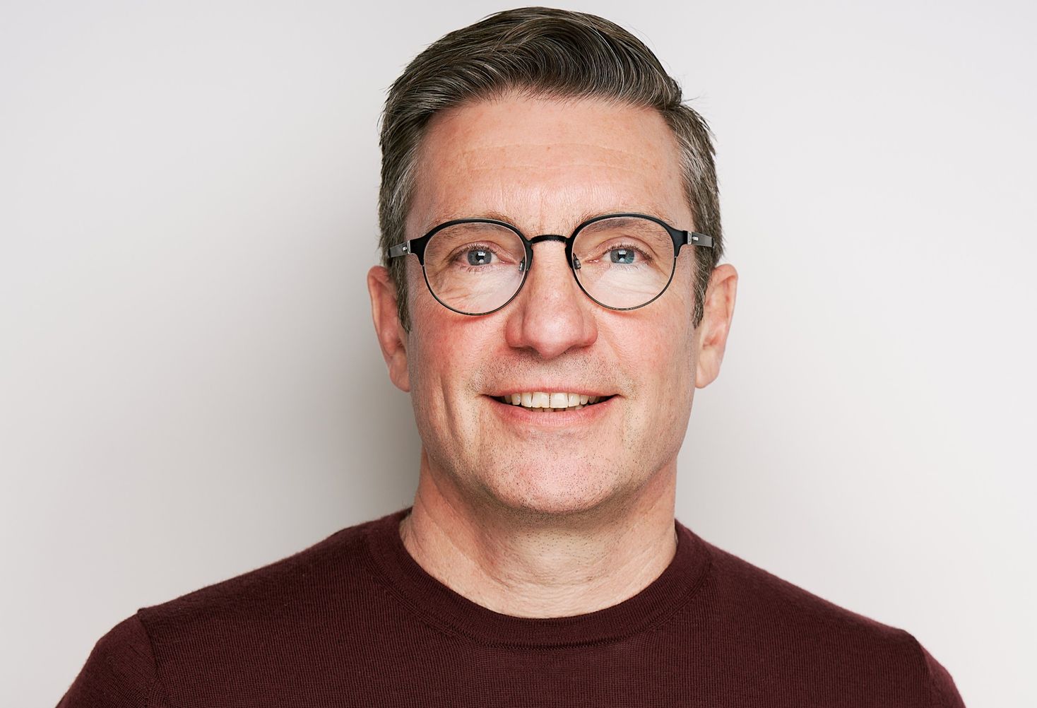 a picture of Steve Carroll smiling at the camera